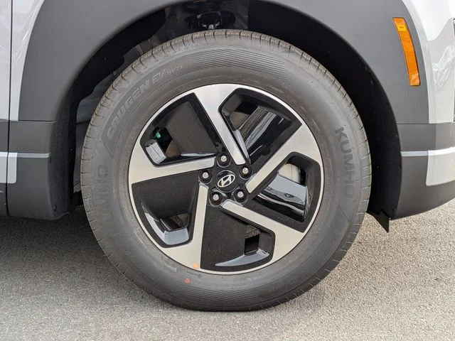 Close-up of an IONIQ 9 aero-style alloy wheel and tire